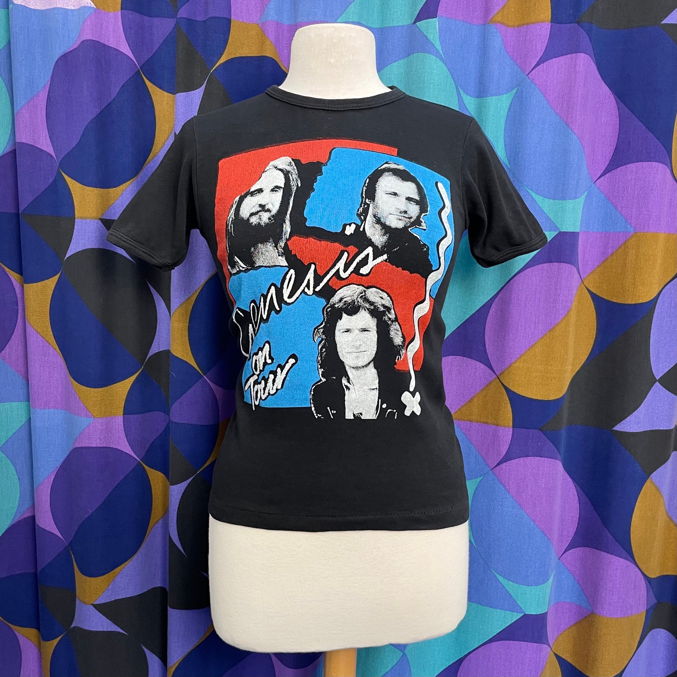 Amazing Vintage 1982 Black Genesis British Tour T-shirt With Amazing Vintage 1982 Black Genesis British Tour T-shirt With