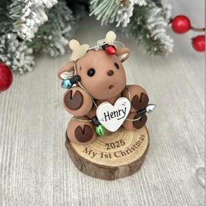 Reindeer Baby First Christmas ornament personalized. Baby boy, Baby girl, Reindeer tangled in Christmas lights, Handcrafted baby gift