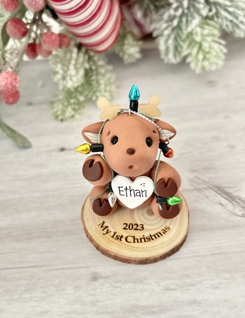 Reindeer Baby First Christmas ornament personalized. Baby boy, Baby girl, Reindeer tangled in Christmas lights image 1