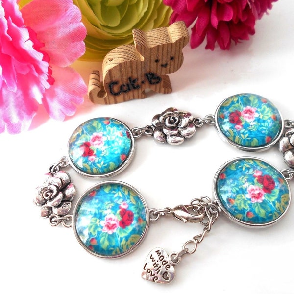 Bracelet bleu cabochons en verre 20 mm fleuris et fleurs en métal argenté vieilli