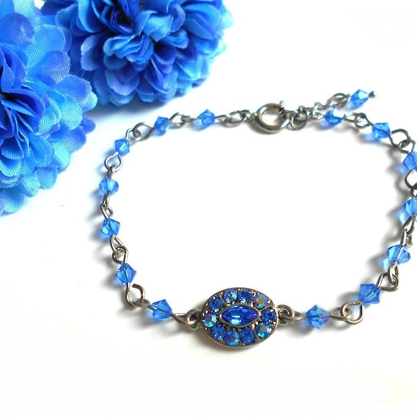 Bracelet ovale avec des perles toupies et des strass en cristal  bleu saphir