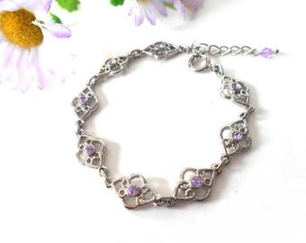 Silver metal bracelet with purple purple crystal rhinestones