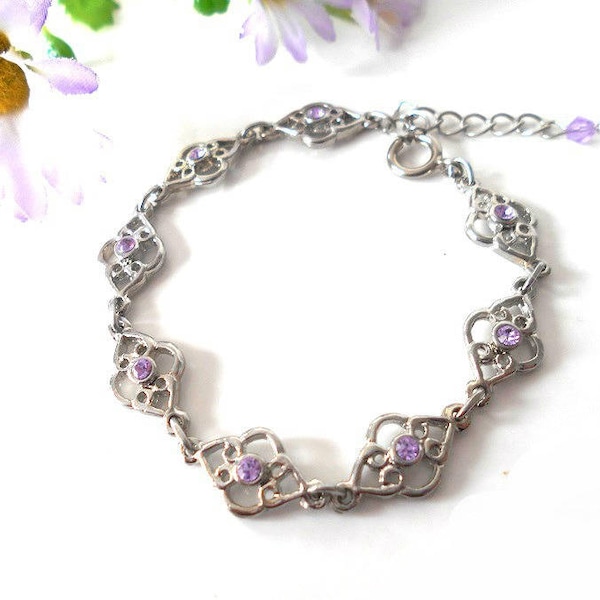 Bracelet en métal argenté avec des strass en cristal  mauve violet