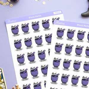 May include: Two sheets of stickers with a purple mortar and pestle design. The stickers say "Blend Herbs" and "Ard & Co."  The stickers are on a light purple background with gold glitter and other decorative items.