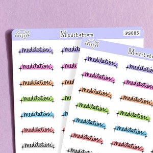 May include: A sheet of stickers with the word "Meditation" written in different colors and styles. The stickers are on a white background and are arranged in rows. The sheet is labeled "PS085".