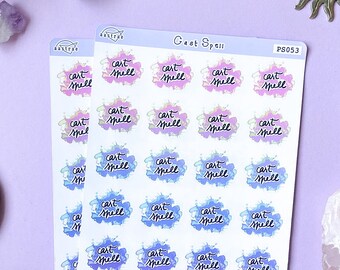 Könnte beinhalten: Eine Bogen mit Aufklebern mit einem Aquarelldesign mit dem Text "cast spell" in einer handschriftlichen Schriftart. Die Aufkleber sind auf einem hellblauen Hintergrund mit einem weißen Rand.