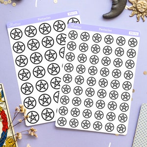 May include: Two sheets of stickers featuring black pentacle symbols, labelled "Pentacles", are shown on a light purple surface. Tarot cards, crystals, a candle, and decorative items surround the stickers. The stickers are labelled "small" and "medium".