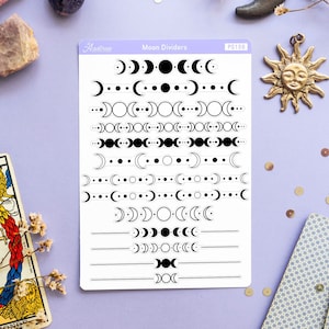May include: A sheet of white sticker paper with black moon phase dividers. The sheet has the text "Aastrac Moon Dividers PS158" printed on it.