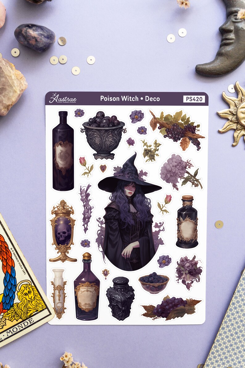 May include: A sheet of stickers featuring a witch with purple hair and a black dress, a cauldron, bottles, and other witchy elements. The stickers are on a white background and have a purple border. The text "Poison Witch &bull; Deco" and "PS420" are printed on the sheet.
