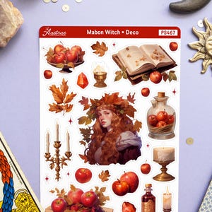 May include: A set of 16 stickers featuring a witch, apples, candles, a book, a bottle, and other autumnal elements. The stickers are white with a red border and the text "Mabon Witch &bull; Deco" and "PS467".