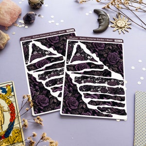 May include: Two sheets of decorative washi tape with a gothic Victorian garden design. The tape features a dark background with purple roses and black leaves. The tape is labeled "Gothic Victorian Garden - Washi PS413".