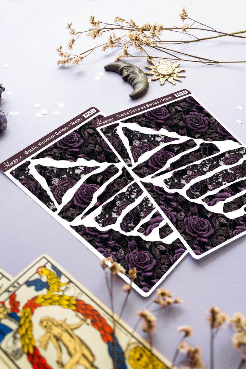 May include: A sheet of decorative washi tape with a gothic Victorian garden design. The tape features a dark background with purple roses and leaves. The text "Gothic Victorian Garden Washi" and "P$413" is printed on the sheet.