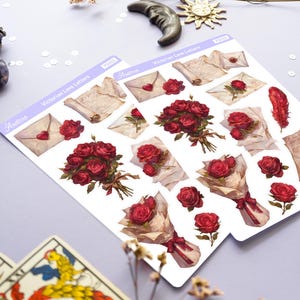 May include: A sheet of stickers featuring Victorian-themed love letters and bouquets of red roses. The stickers are printed on clear, glossy paper and are perfect for adding a touch of vintage romance to your planner, journal, or scrapbook.