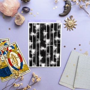 May include: A sheet of washi tape with a black and white night sky design. The tape is labeled "Night Sky Washi" and "WSD10".