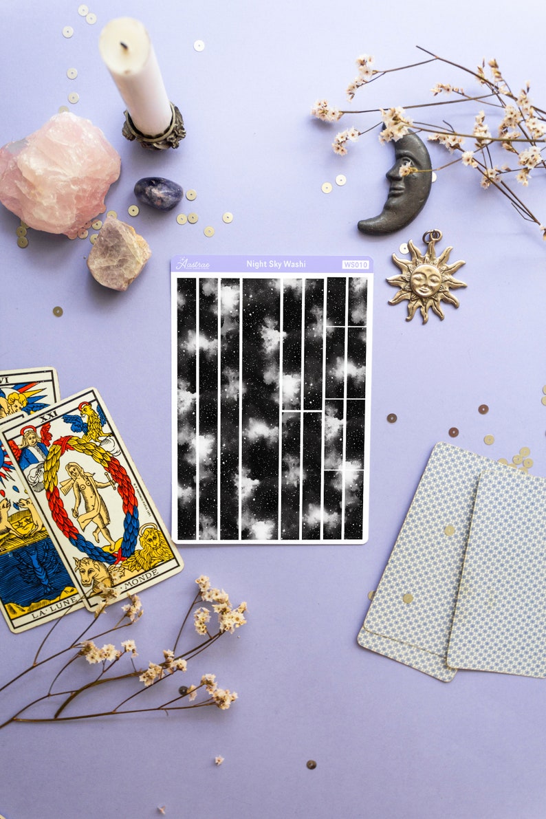 May include: A sheet of washi tape with a black and white night sky design. The tape is labeled "Night Sky Washi" and "WSD10".