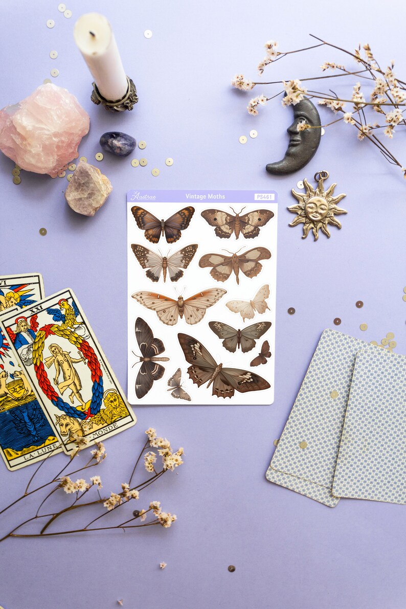 May include: A sheet of vintage moth stickers with a light brown background. The stickers feature detailed illustrations of moths in various poses. The sheet is labeled "Vintage Moths" and "PS461".