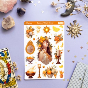 May include: A sheet of stickers featuring a summer witch theme. The stickers include a woman with a crown of oranges, a sun, a candle, a mirror, and a bowl of oranges. The stickers are on a white background with the text "Summer Witch - Deco" and "PS444" printed on the sheet.