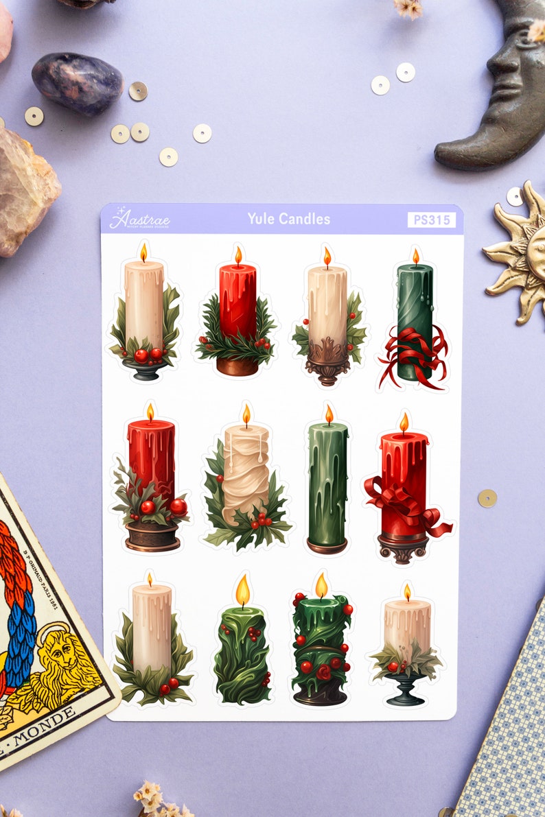 May include: A sheet of 12 Yule candle stickers. The stickers feature various candles in red, green, and white with holly and ribbon accents. The stickers are labeled "Yule Candles" and "PS315".