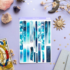 May include: A sheet of blue and white washi tape with a starry night sky and cloud design. The sheet is labeled "Blue Washi" and "PS231".