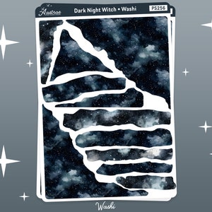May include: A sheet of washi tape featuring a dark blue and black galaxy design. The tape is cut into irregular shapes, creating a unique and whimsical look. The text "Dark Night Witch" and "Washi" is printed on the sheet.