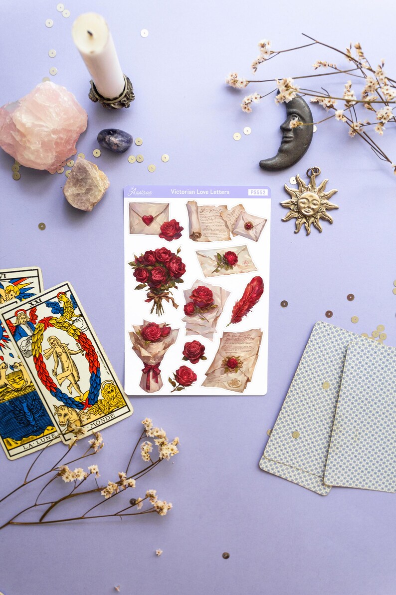 May include: A sheet of stickers featuring Victorian-era love letters, roses, and envelopes. The stickers are on a white background with a purple border and the text "Victorian Love Letters" printed at the top.