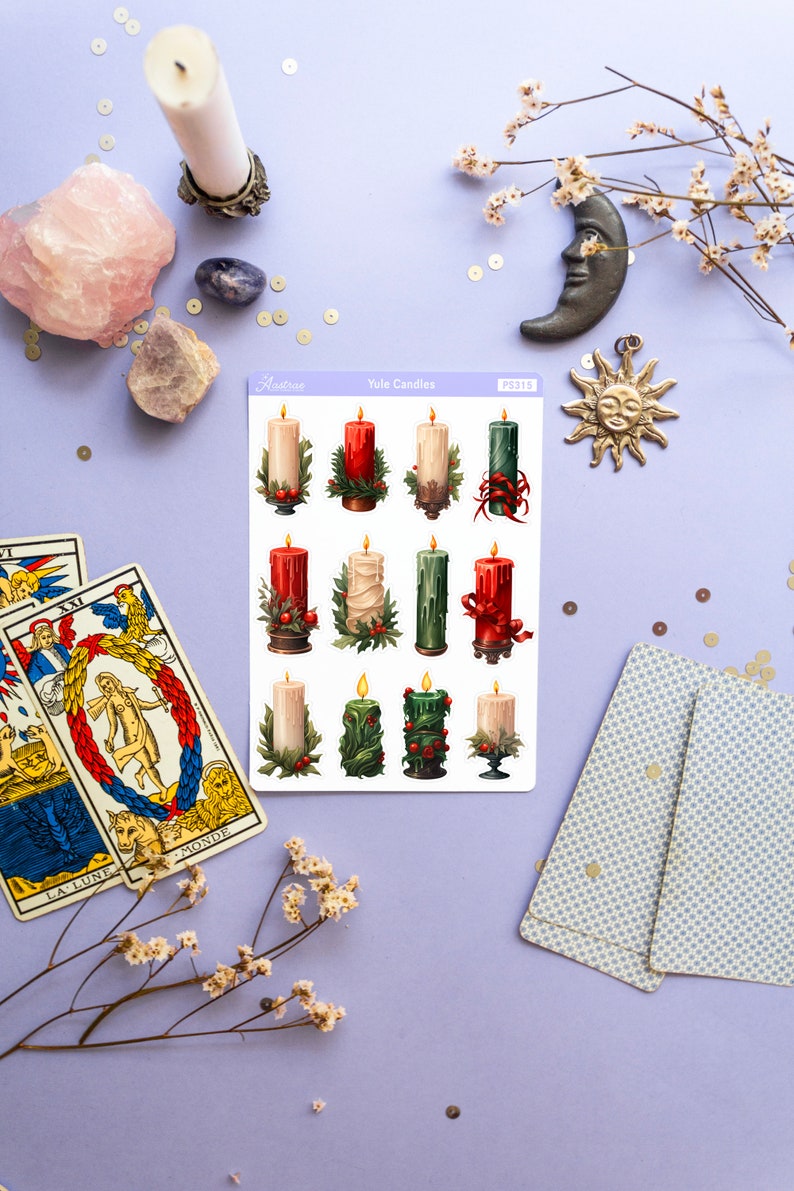 May include: A sheet of stickers featuring 12 illustrated Yule candles in red, green, and white. The candles are decorated with holly, berries, and ribbons. The stickers are labeled "Yule Candles" and "PS3115".