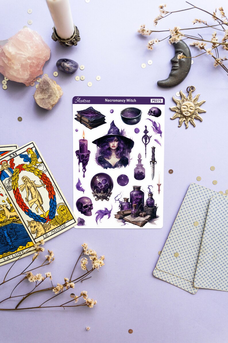 May include: A sheet of stickers featuring a purple witch with a cauldron, skulls, potions, and other magical items. The sticker sheet is titled "Necromancy Witch" and has the number PS275 in the top right corner.