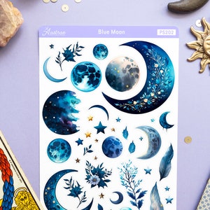 May include: A sheet of blue moon themed stickers with crescent moons, full moons, and stars. The stickers are on a white background with the text "Blue Moon" and "PS202" printed on the sheet.