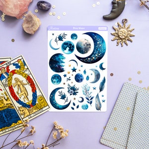 May include: A sheet of blue moon themed stickers with various crescent moons, full moons, stars, and floral designs. The sticker sheet is labeled "Blue Moon" and "PS202".