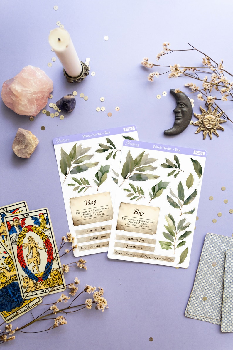 May include: Two sheets of stickers featuring watercolor illustrations of bay leaves with text about the herb's properties. The text reads "Bay", "Protection + Purification", "Psychic Powers", "Strength + Healing", "Element: Fire", "Planet: Sun", "Deities: Aesculapius, Apollo, Ceres, Faunus, Eros".
