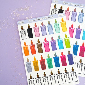 May include: A sheet of colorful candle stickers with the text "Color Candles Magick" and "aastrae.etsy.com". The stickers feature various colors of candles with dripping wax and flames.