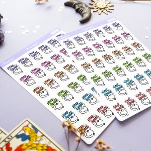 May include: Two sheets of stickers with colorful illustrations of moons and stars. The stickers are labeled "Prep Spell" and "Cast Spell".