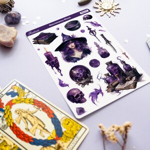 May include: A sheet of stickers featuring a purple and black witch with a cauldron, skulls, potions, and other magical items. The stickers are labelled "Necromancy Witch" and "Aastrae".