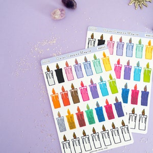 May include: Two sheets of colorful candle stickers with the text "Color Candle Magic" and "aastrao.etsy.com". The stickers feature various colors of candles with a flame on top.