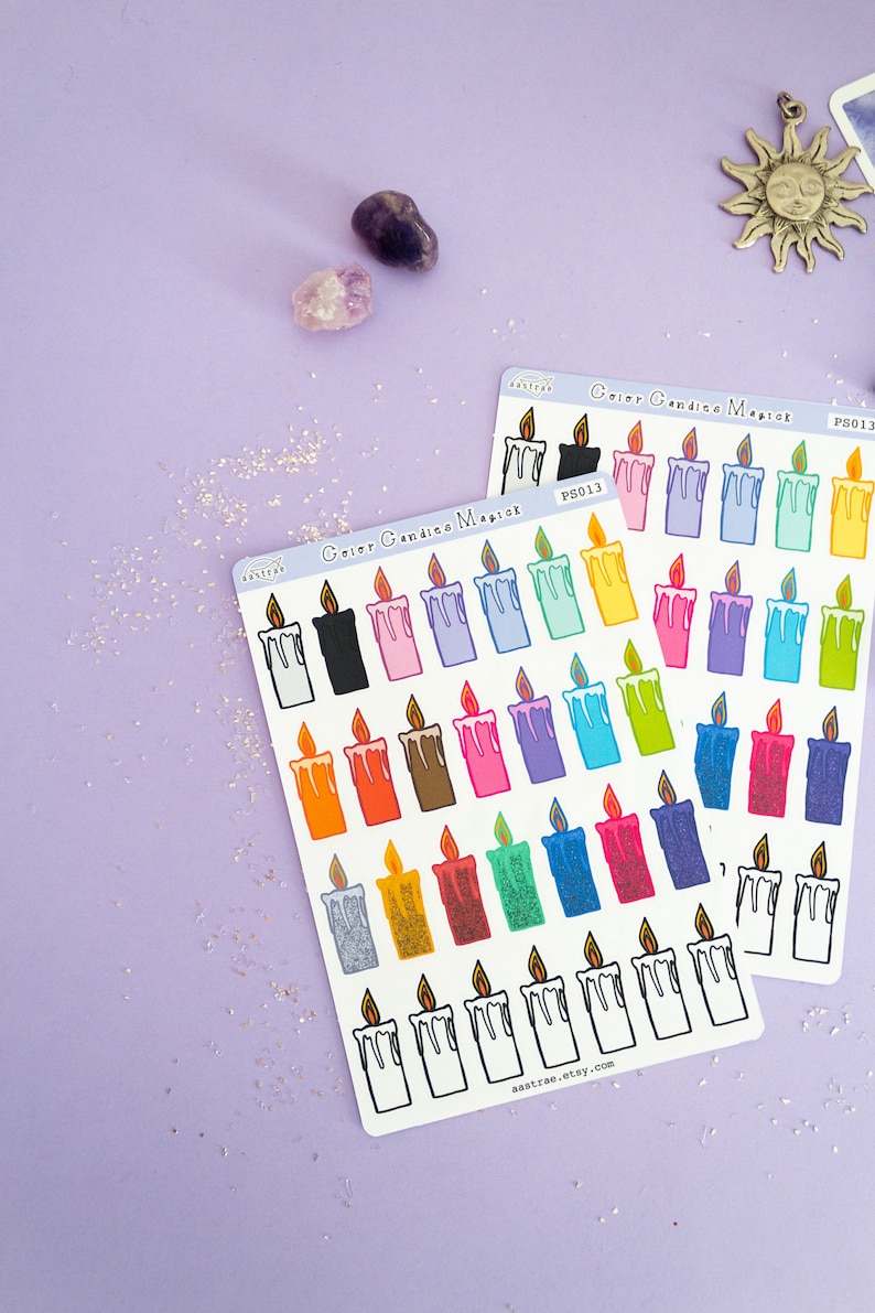 May include: Two sheets of colorful candle stickers with the text "Color Candle Magic" and "aastrao.etsy.com". The stickers feature various colors of candles with a flame on top.