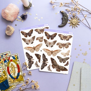 May include: Two sheets of vintage moth stickers with brown and white moths on a light purple background. The stickers are labeled "Vintage Moths" and have the product number "PS461".
