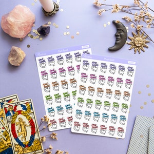 May include: Two sheets of stickers with colorful illustrations of moons and stars. The stickers are labeled "Cast Spell" and "Prep Spell".
