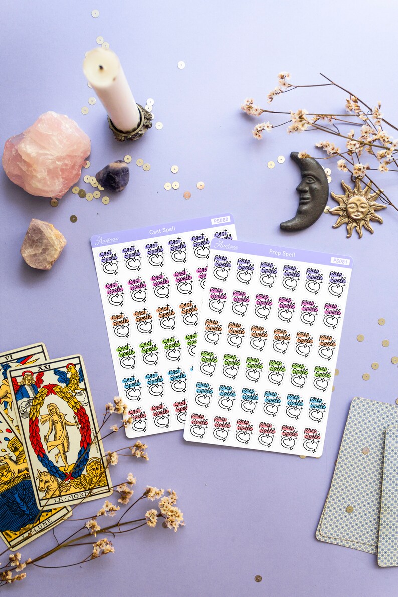 May include: Two sheets of stickers with colorful illustrations of moons and stars. The stickers are labeled "Cast Spell" and "Prep Spell".