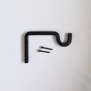 May include: Black metal shelf bracket with two black screws.