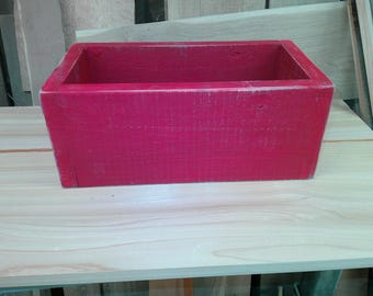 red primitive wooden box