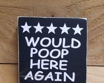 would poop here again five stars bathroom wood black sign