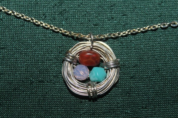 Nest necklace hotsell with eggs