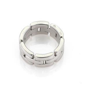 May include: A silver Cartier Juste un Clou ring with a linked chain design. The ring is made of polished metal and has a smooth, rounded surface.