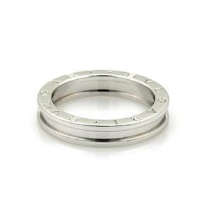 May include: A silver ring with a double row of Roman numerals around the band.