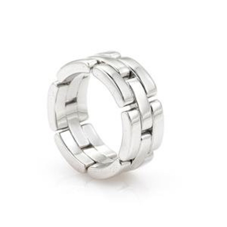 May include: A silver metal ring with a wide band. The band is made up of multiple connected rectangular pieces that create a textured look.