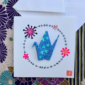 Blue and turquoise origami double crane map
