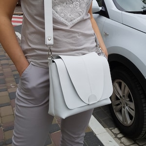 Available in 17 colors! White crossbody with flap, bag with wide shoulder strap, white crossbody purse