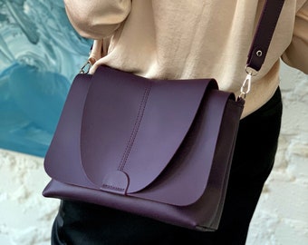 Available in 17 colors! Purple crossbody with flap, bag with wide shoulder strap, purple crossbody purse