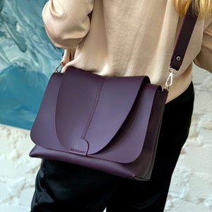 Available in 17 colors! Purple crossbody with flap, bag with wide shoulder strap, purple crossbody purse