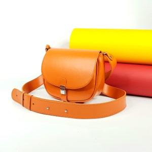 Orange crossbody, bag with wide shoulder strap